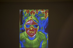 a face through a thermal imaging camera. You can see cold and warm spots
