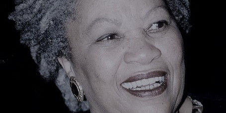 A black and white portrait of Toni Morrison, an African-American writer