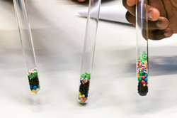 Test tubes filled with colourful beads
