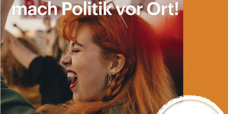 A woman at a demonstration, writing ‘Get involved in local politics'