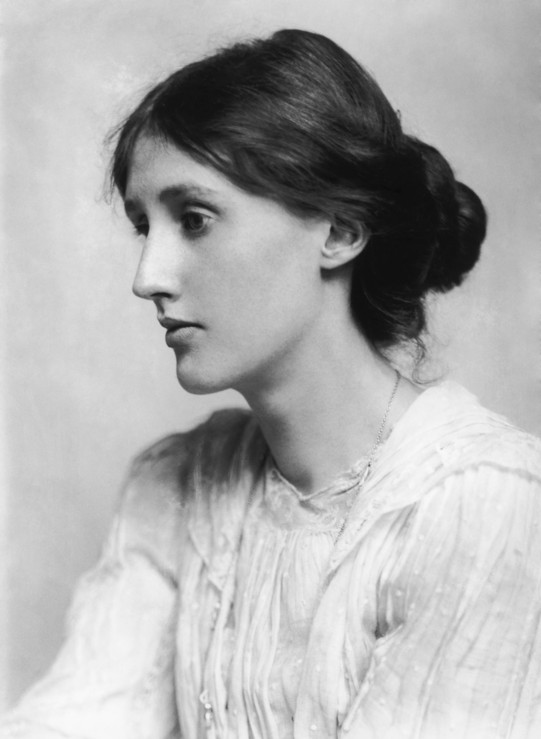 Side portrait of a young woman in black and white. 